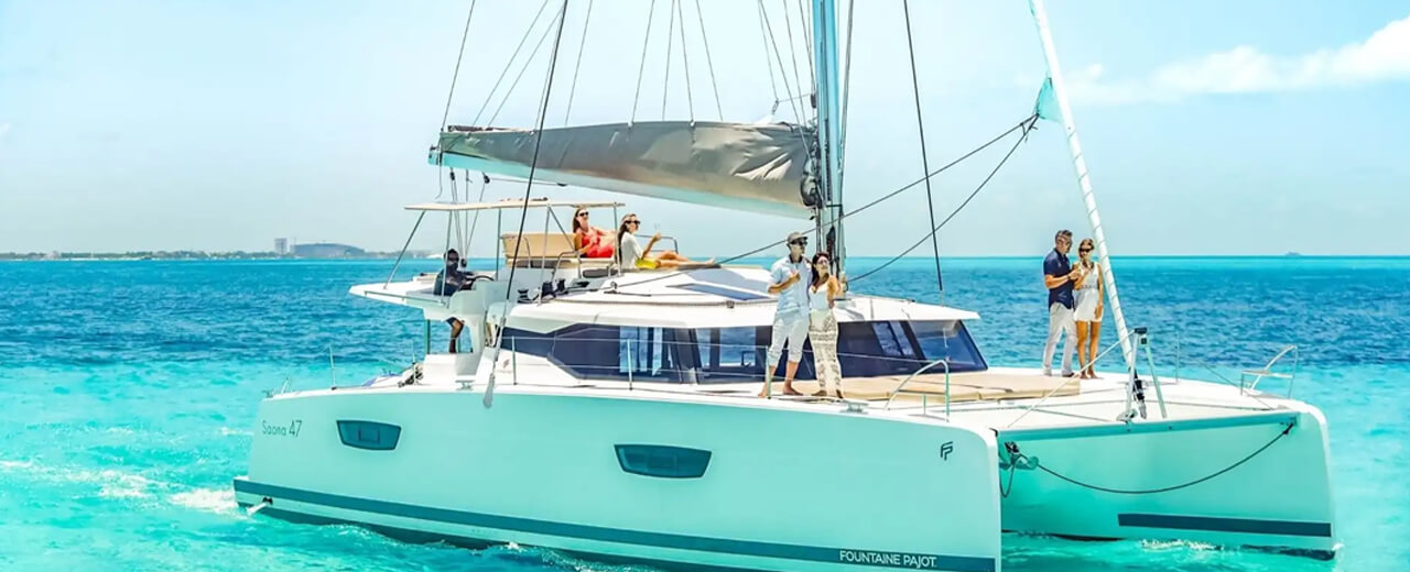 Isla Mujeres Catamaran Tour with Snorkeling, Lunch & Optional Transfer | FlyDunya
